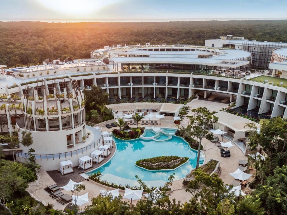 Aerial view of the cenote-style pools at Secrets Tulum Resort & Beach Club