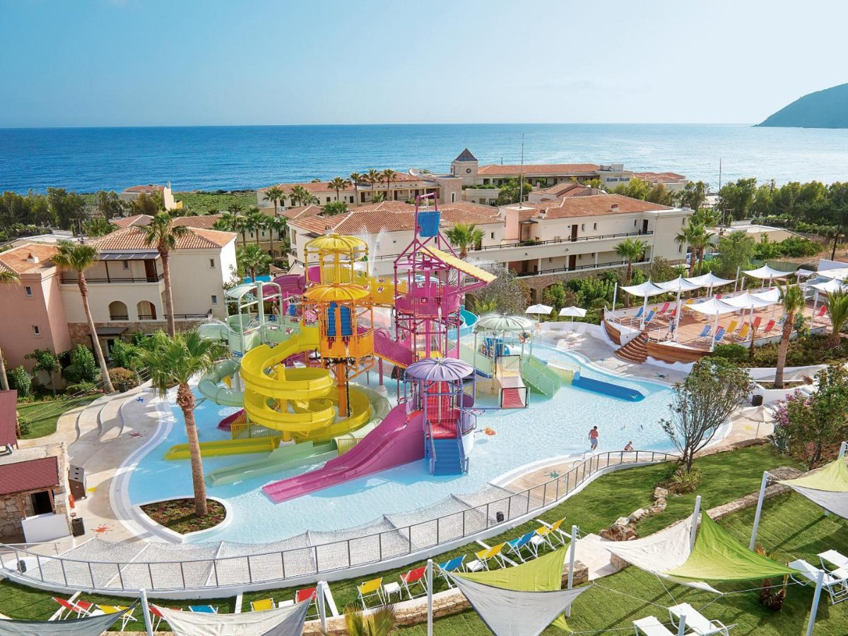 Slide tower and splash pools at the aqua park of Grecotel Marine Palace in Panormo, Crete