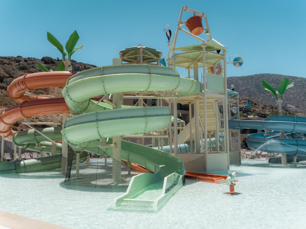 Water slide towers above the splash pool at Elios Hill in Crete