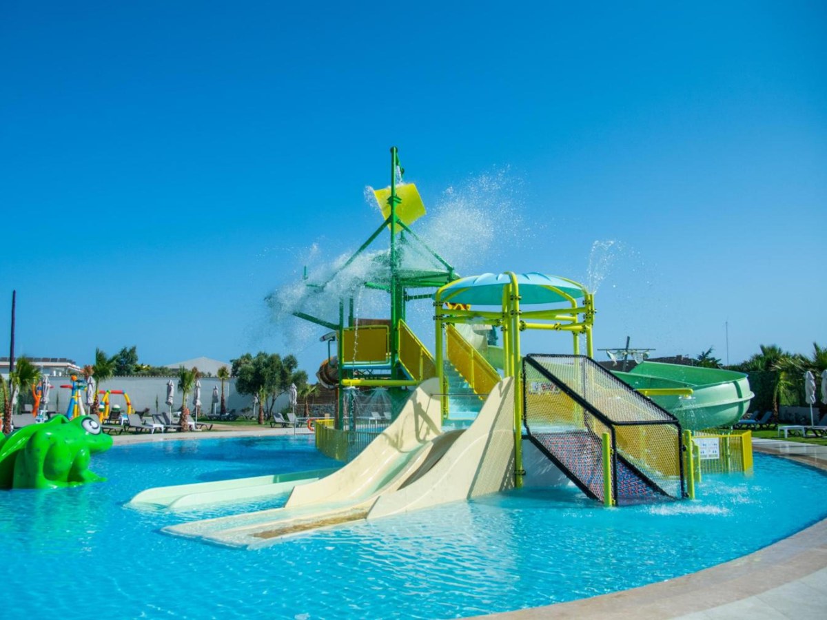 Slide tower in the Aquadventure pool at SENSEANA Sea Side Resort in Crete