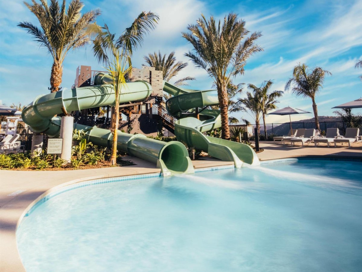 Green two-story waterslides above the Splash Pool at Park Hyatt Aviara in Carlsbad