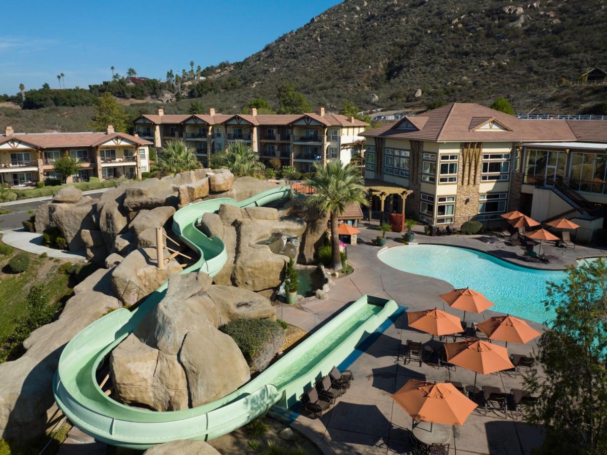 Waterslide winding through rocks beside the pool at Hyatt Vacation Club at The Welk in Escondido