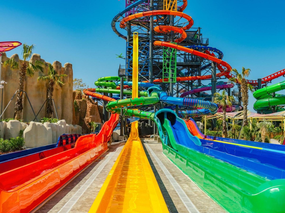 Multi-lane racer slides and slide towers at The Land of Legends Nickelodeon Hotel