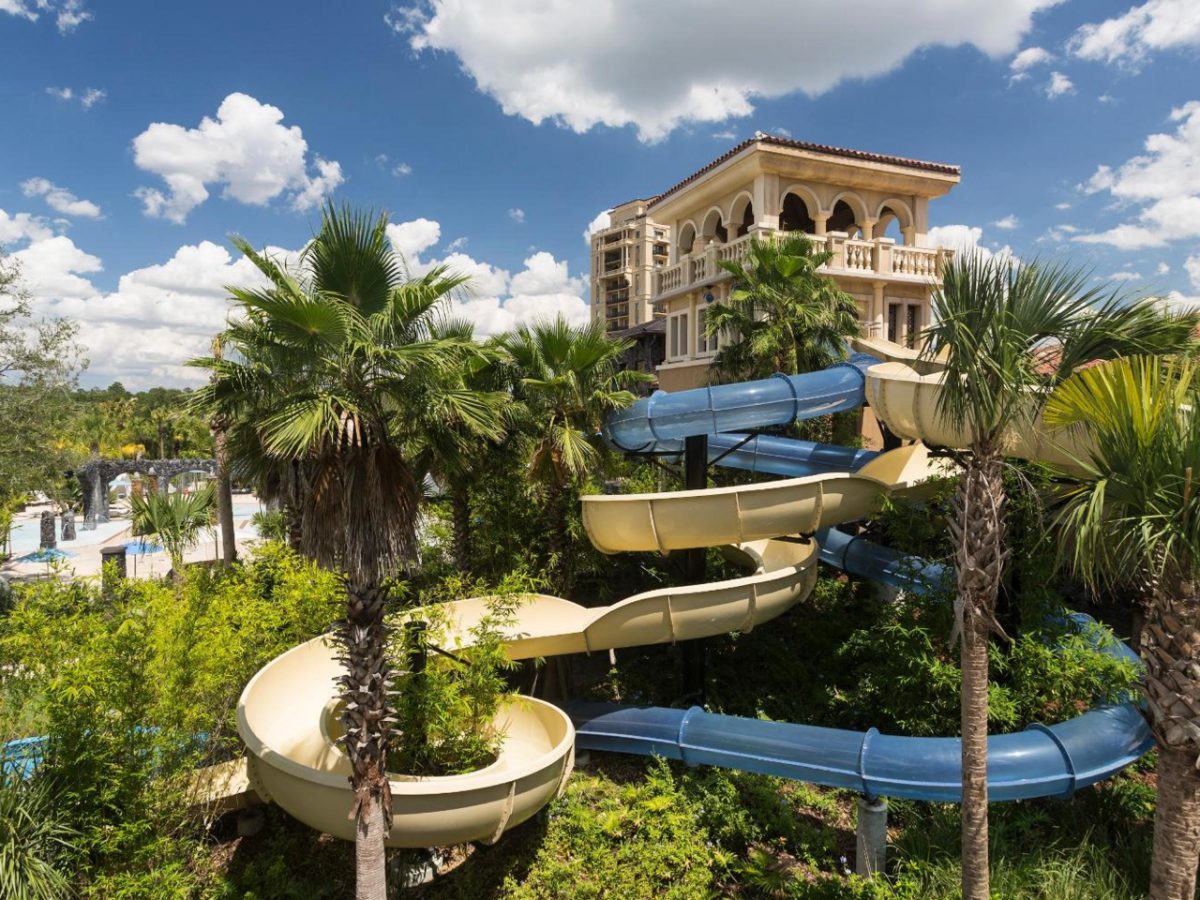 Twisting water slides among palms at Four Seasons Resort Orlando's Explorer Island