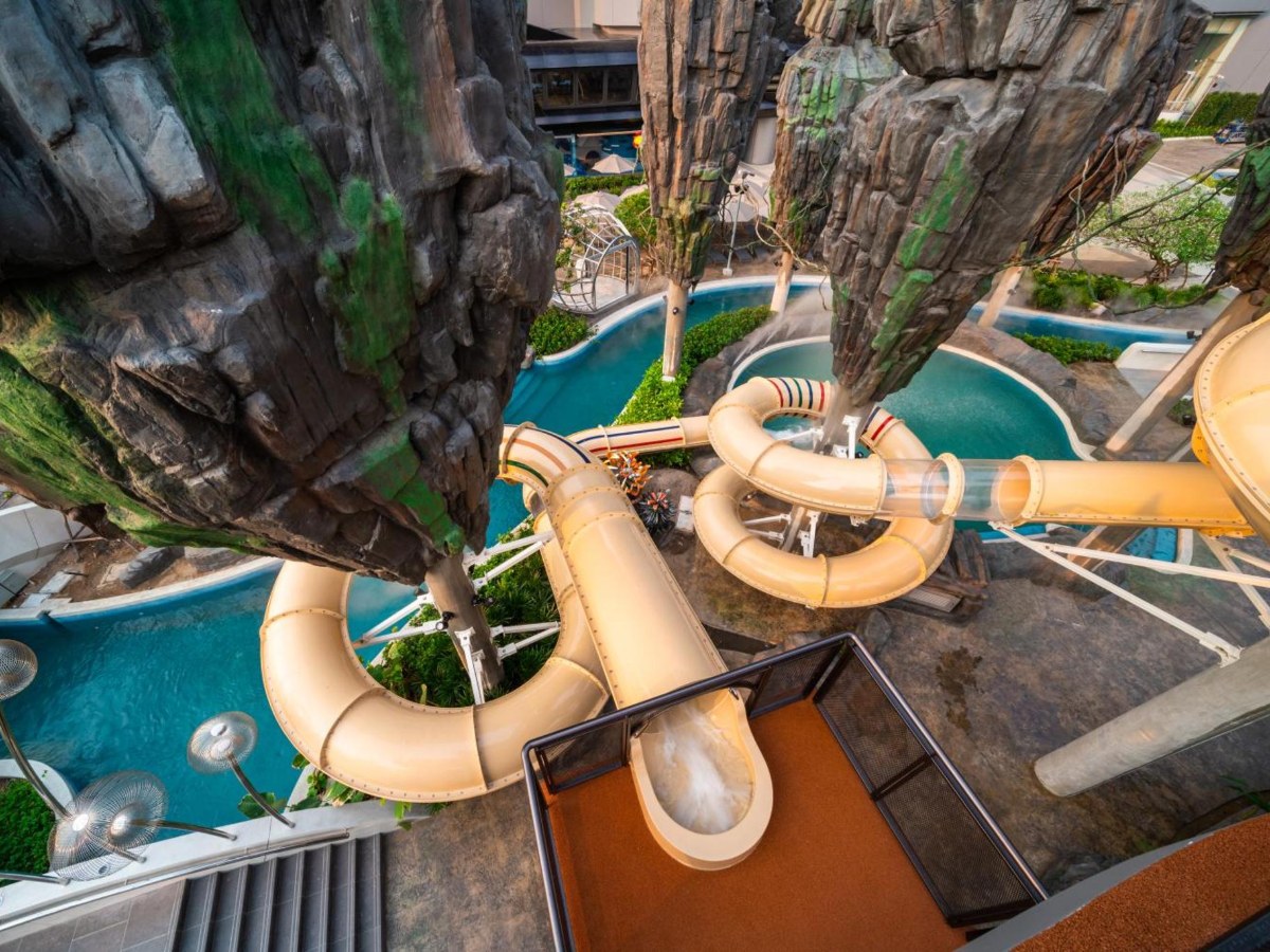 Tube water slides above the lazy river at Grande Centre Point Space Pattaya