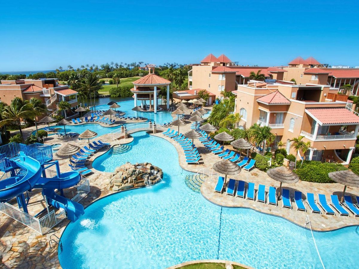 Aerial view of the pool with water slides at Divi Village Golf and Beach Resort