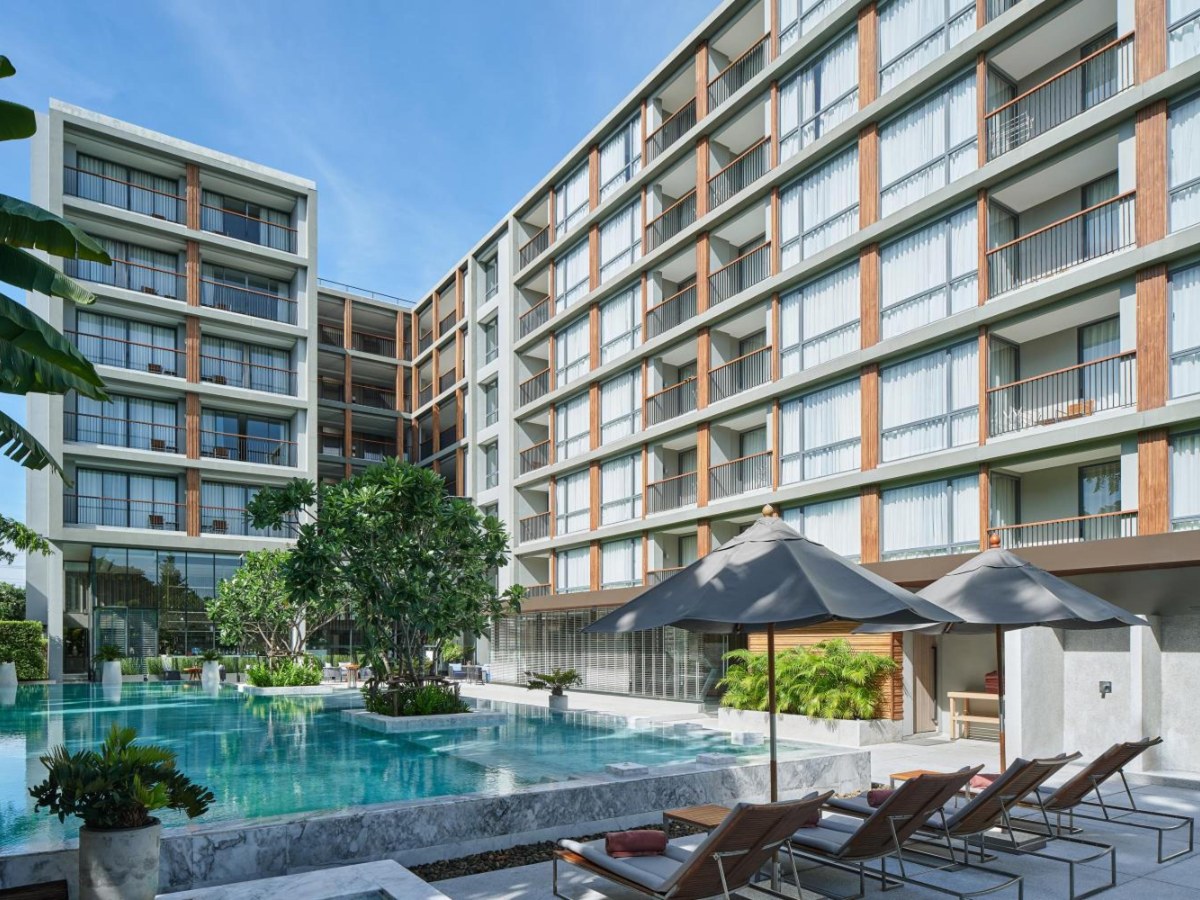 Swimming pool and loungers beside The Park Nine Hotel Suvarnabhumi