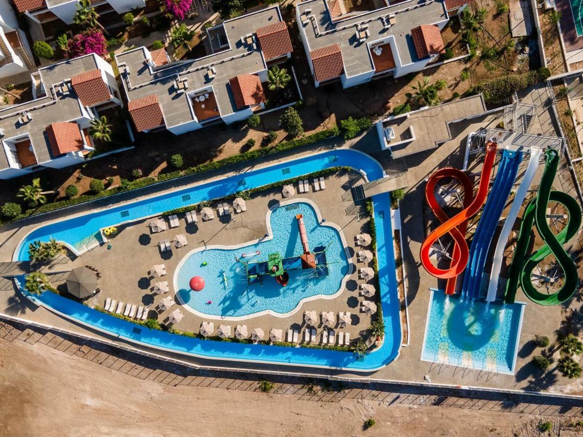 Aerial view of the slides and pools of the aqua park at Kapetanios Aqua Resort in Coral Bay