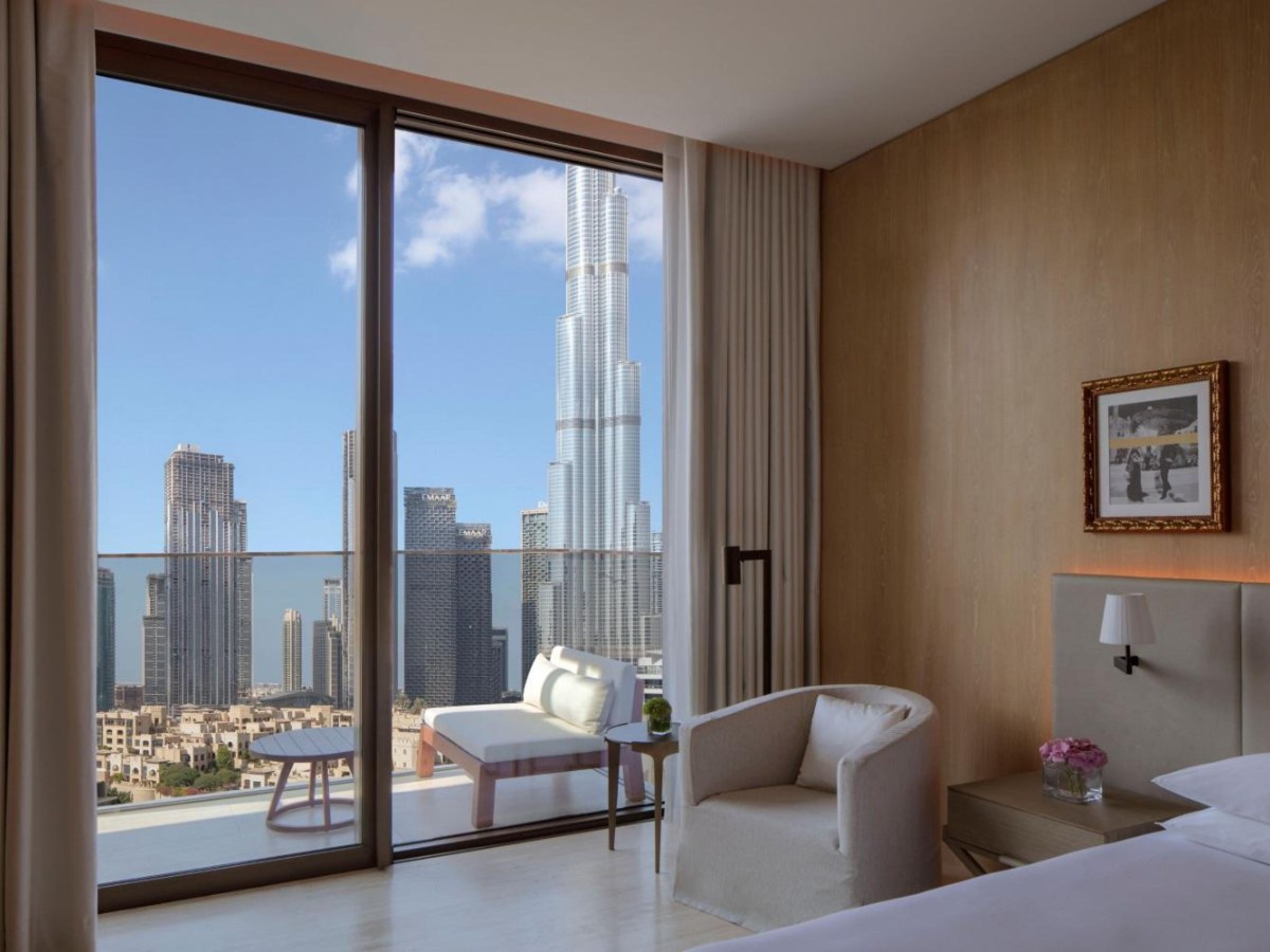 Deluxe room at The Dubai EDITION with the Burj Khalifa beyond the balcony