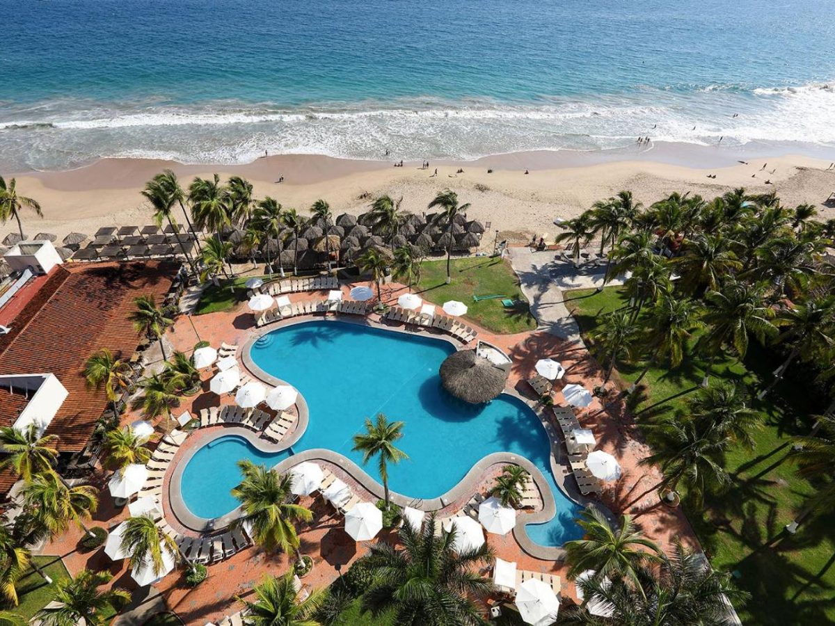 Aerial view of the pool and beach at Emporio Ixtapa