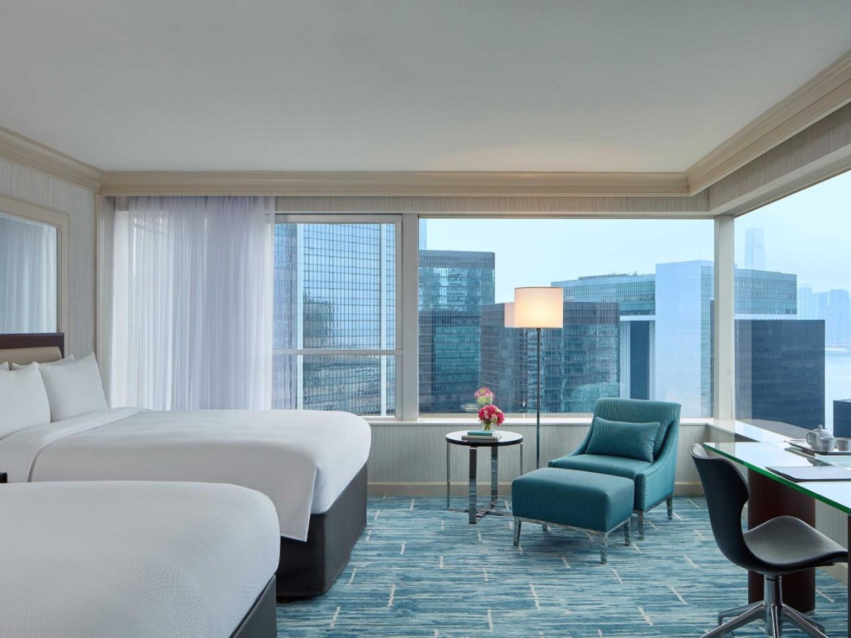 Large room with two double beds and a corner city view at JW Marriott Hotel Hong Kong