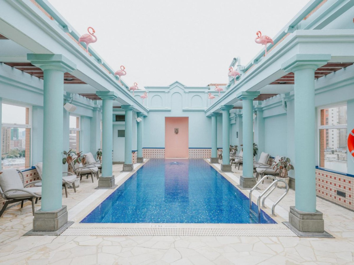 Eaton HK blue-columned rooftop pool in Moroccan-inspired style