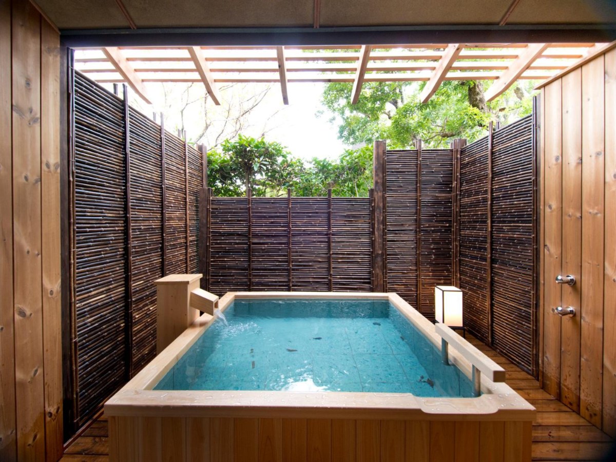 Private open-air bath in a screened garden court at ABBA Resorts Izu Zagyosoh