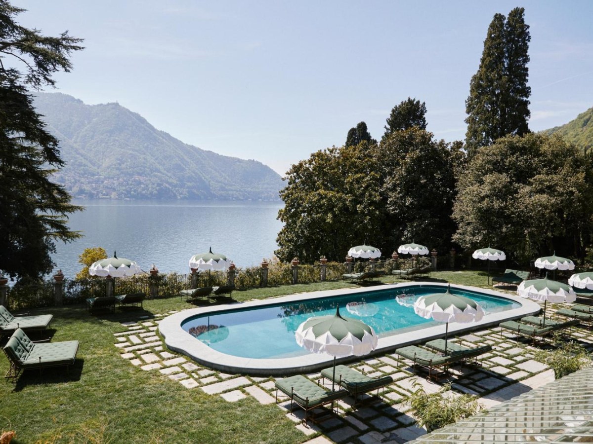 Garden pool with Lake Como behind at Passalacqua in Moltrasio