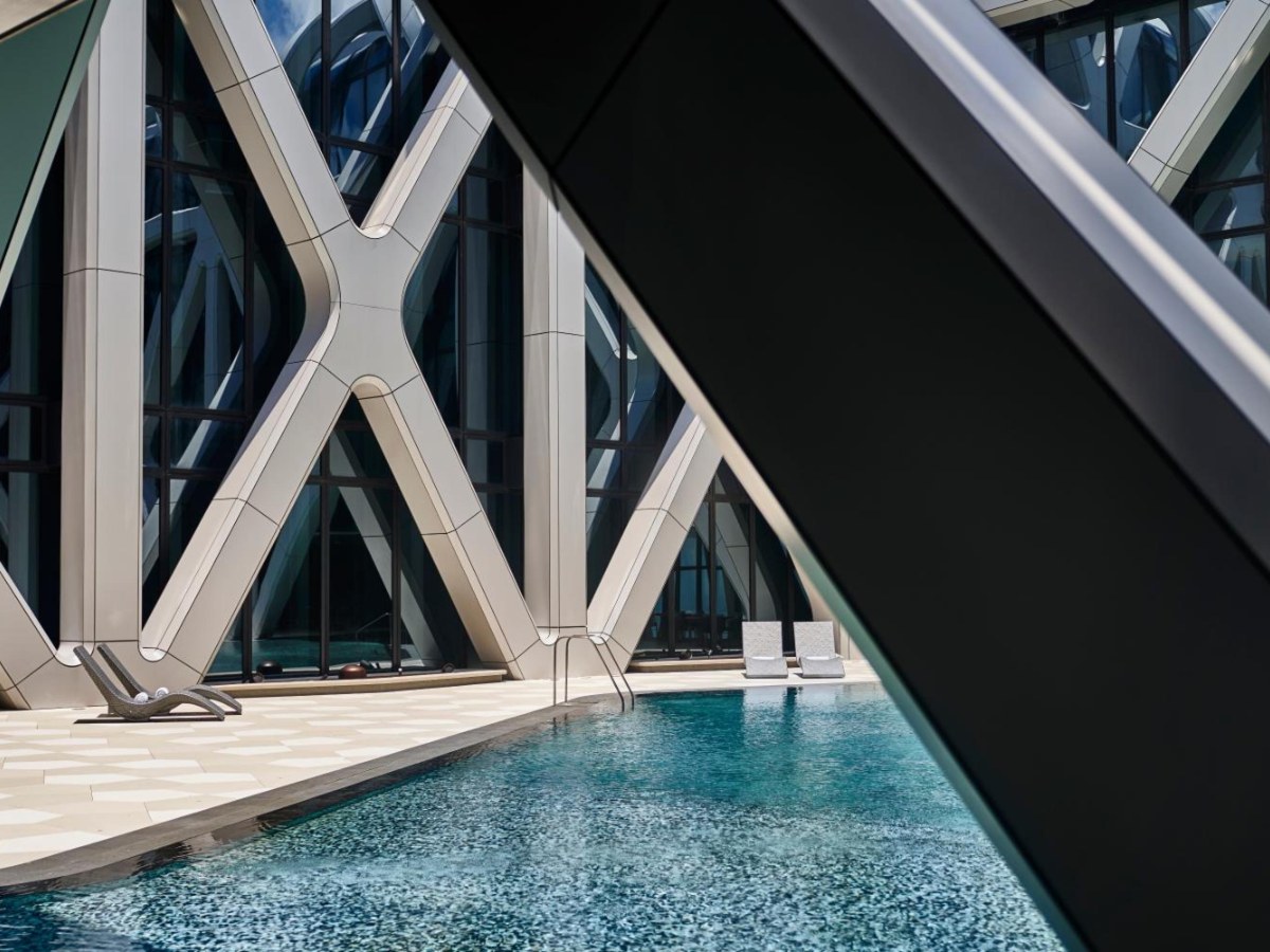 Swimming pool beneath the steel lattice tower at Morpheus