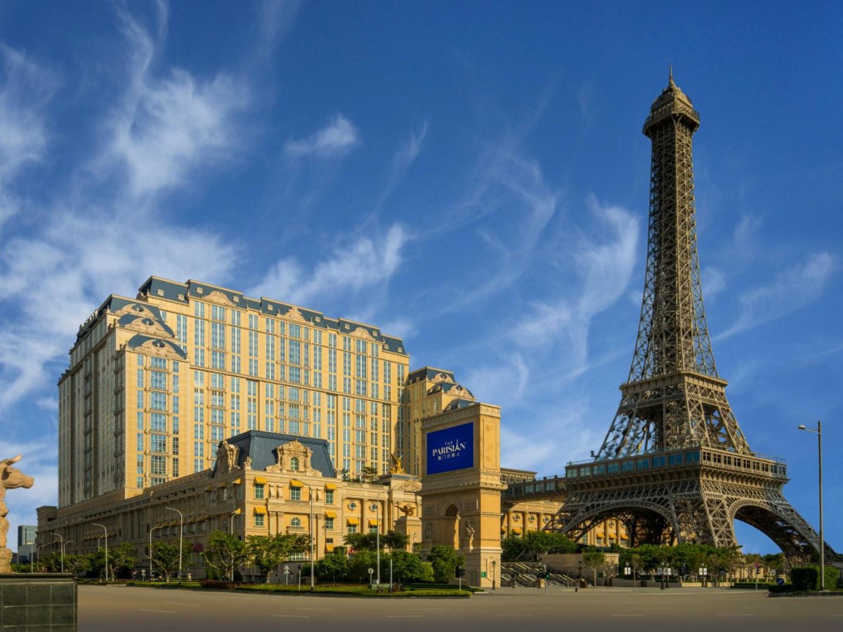 Eiffel Tower replica beside the golden facade of The Parisian Macao