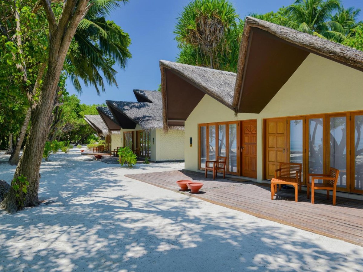 Beach villas on white sand at Adaaran Select Hudhuran Fushi