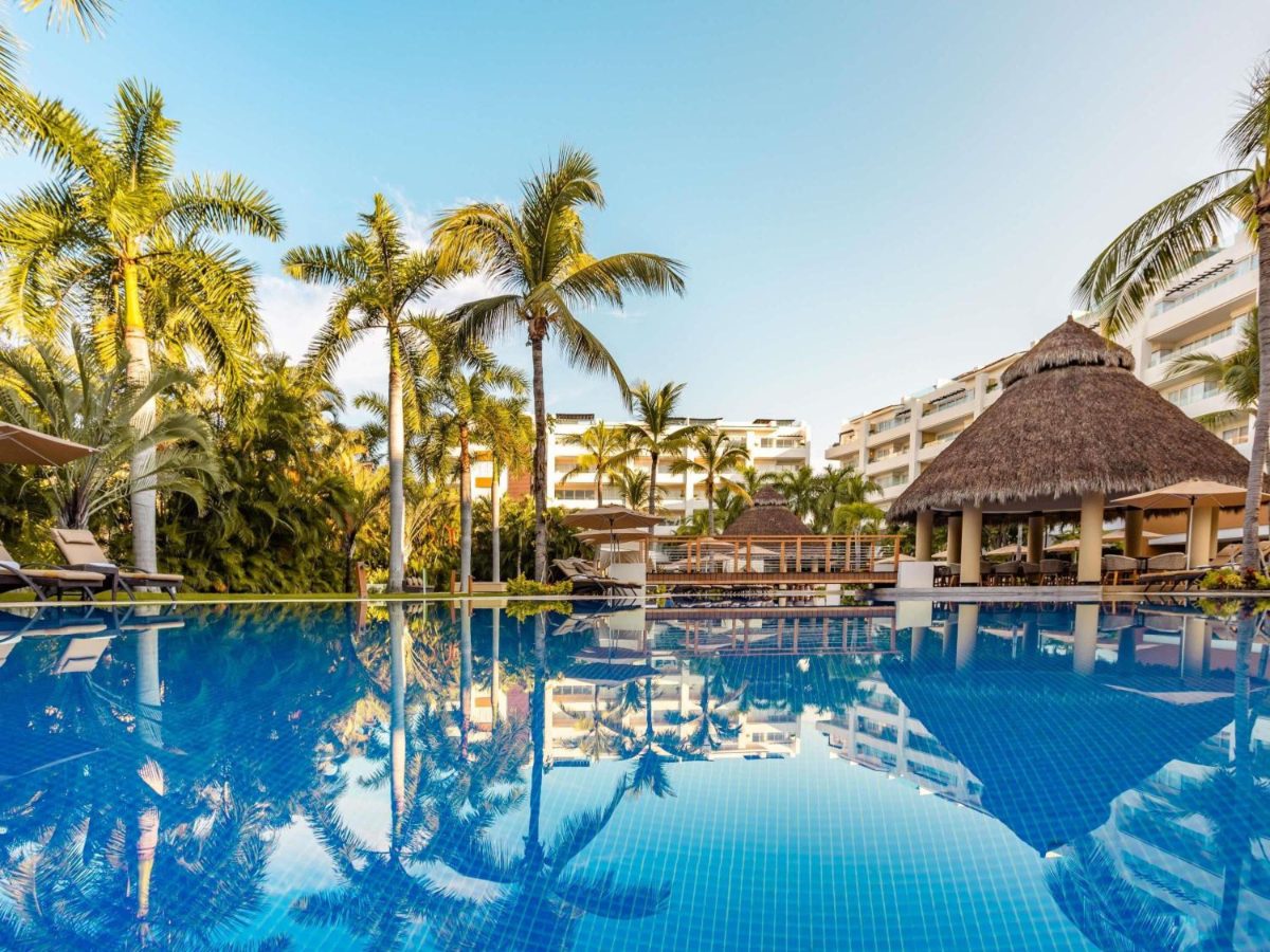 Pool and palapa bar at Marival Distinct