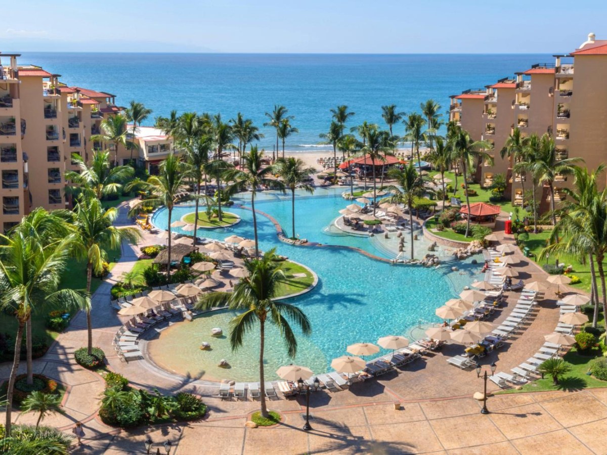Aerial view of the winding pool at Villa Del Palmar Flamingos