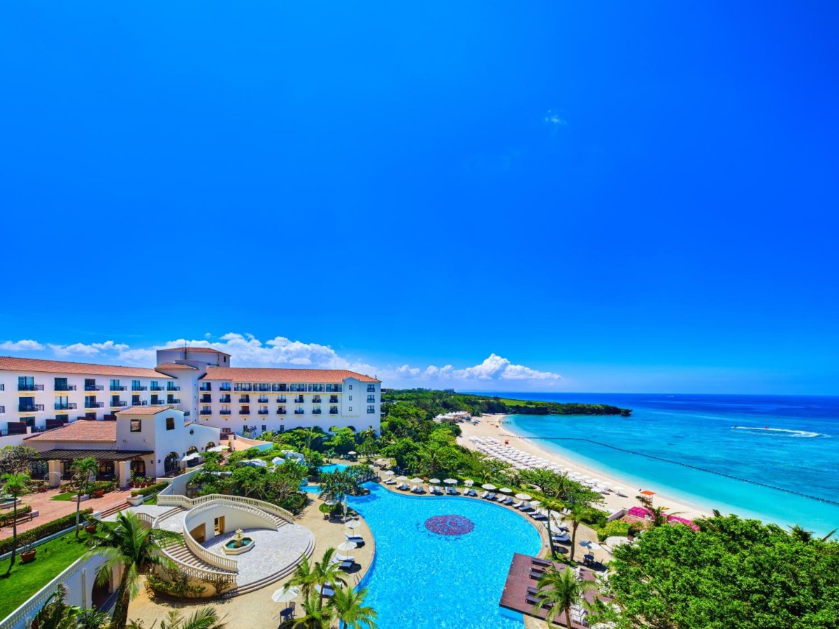 Pool with the beach beyond at Hotel Nikko Alivila