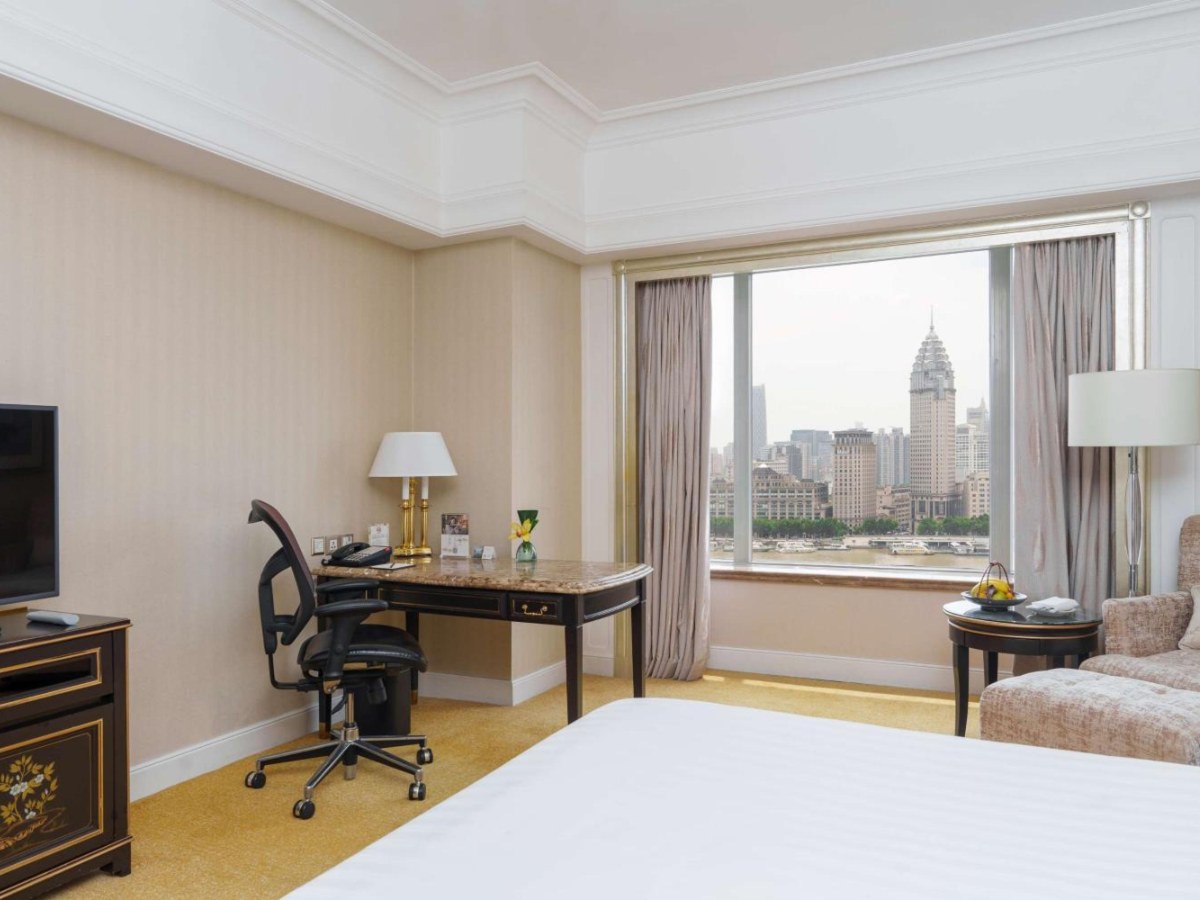 Bund buildings seen through the window of a Deluxe Bund King Room at Pudong Shangri-La