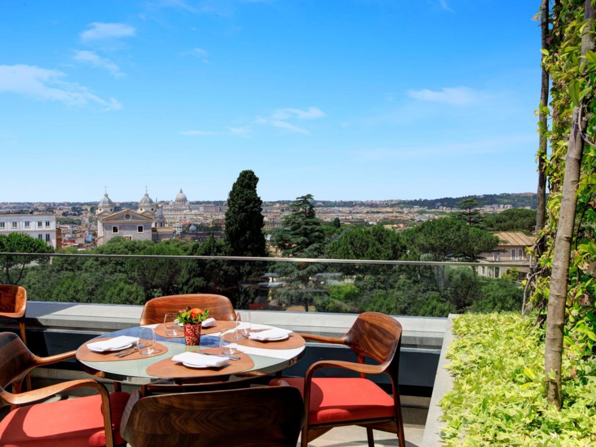 Terrace table at Hotel Eden looking over the rooftops of Rome