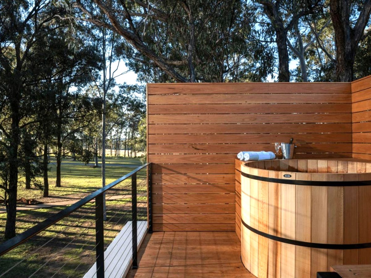Timber hot tub on the private deck of a Grand Spa Suite at Tower Lodge