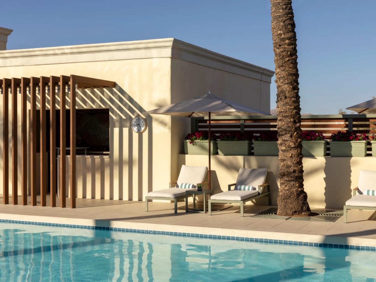 Spa pool with cabanas and palms at Fairmont Scottsdale Princess