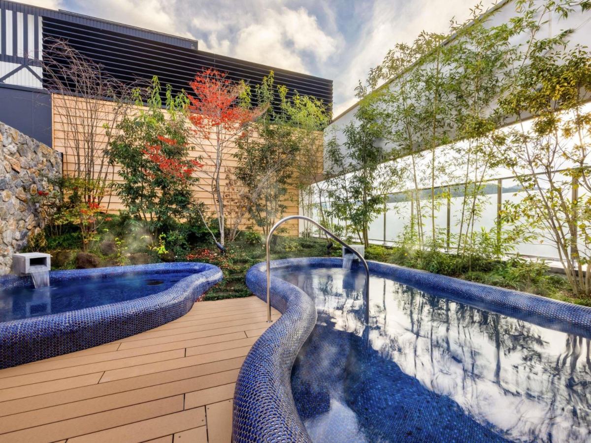Blue-tiled open-air bath at Mercure Hida Takayama